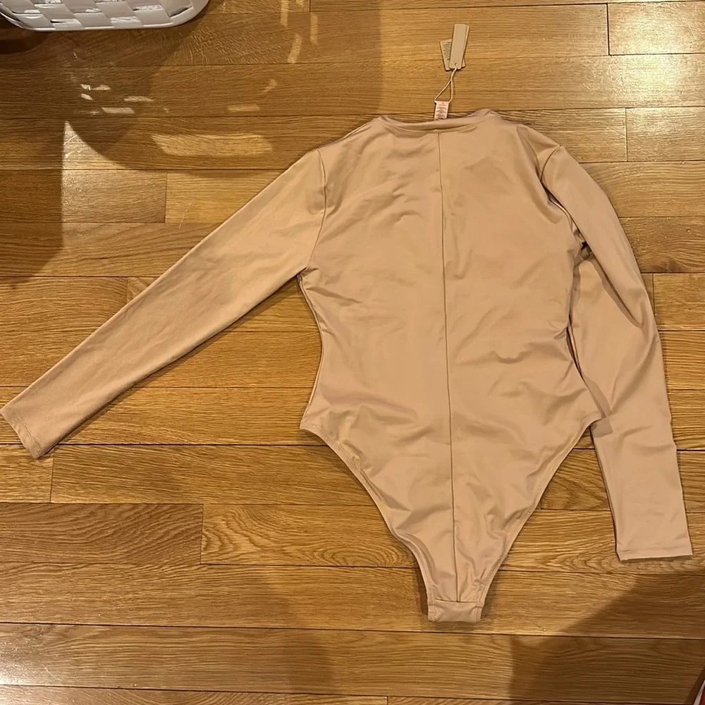 SKIMS SWIM ZIP FRONT LONG SLEEVE ONE PIECE in Ochre NEW